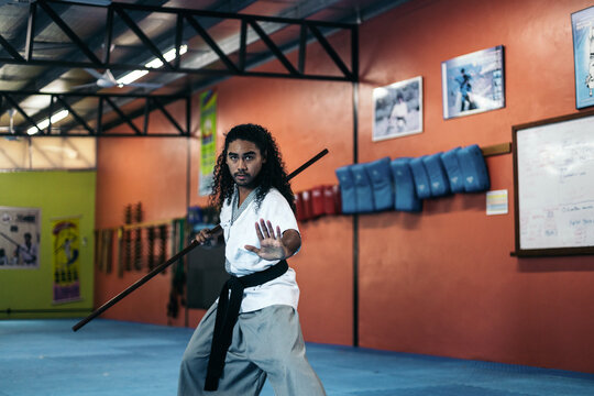 Haidong gumdo fighter training with a rod