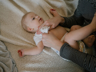 Changing clothes on the baby