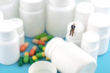 Miniature creative old man and medicine