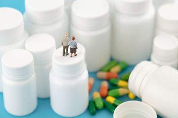 Miniature creative old man and medicine