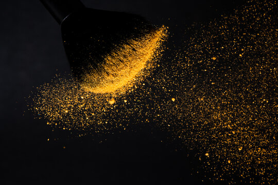 Make up brushes with golden face powder