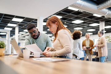 Coworkers working on project together