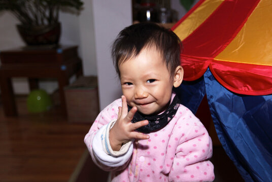 Closeup happy asian kid with tears
