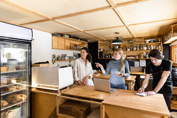 Work Meeting In Cafe