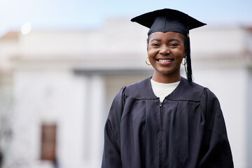 I always believed in myself. Portrait of a young woman on graduation day.