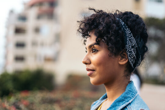 Young beautiful woman with curly hair