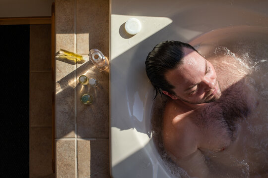 Man relaxing in spa bath