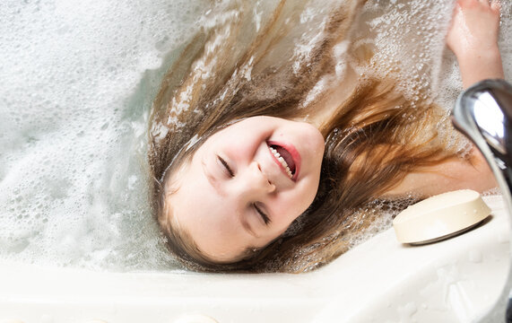 beautiful girl relaxing in spa bath