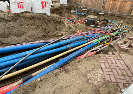 cables in broken up street