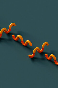 a row of Abstract yellow curves on blue