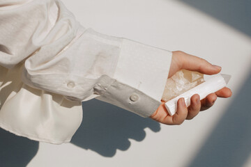 Woman's Hand with white crystals