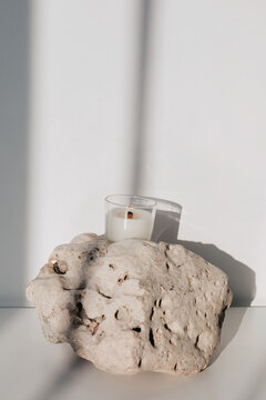 Aromatic candle on stone