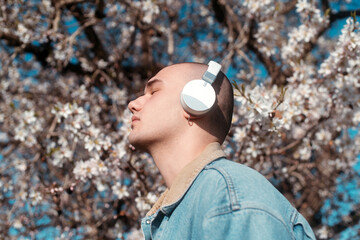 Man using wireless headphones