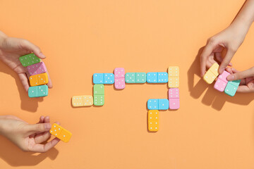 Two-player are playing dominoes