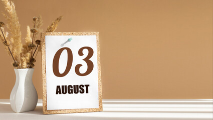 august 3. 3th day of month, calendar date.White vase with dead wood next to cork board with numbers. White-beige background with striped shadow. Concept of day of year, time planner, summer month