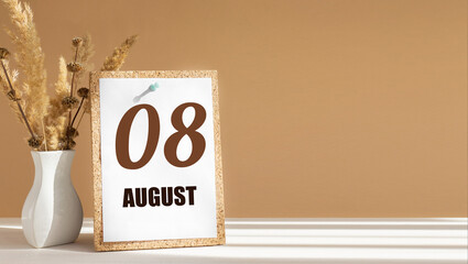august 8. 8th day of month, calendar date.White vase with dead wood next to cork board with numbers. White-beige background with striped shadow. Concept of day of year, time planner, summer month