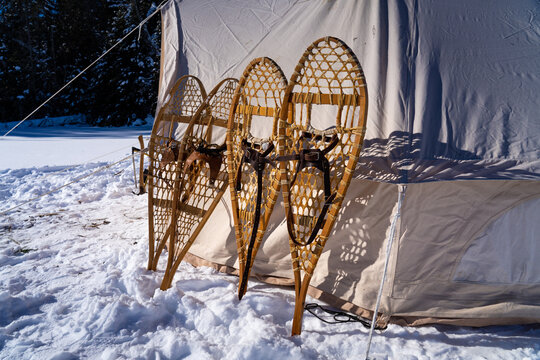 Tranditional Snowshoes with Canvas Tent on Frozen Lake