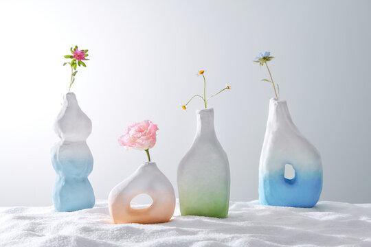 Flowers in a vase isolated on white background