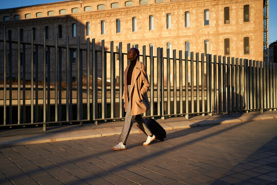 Businesswoman walking on city street