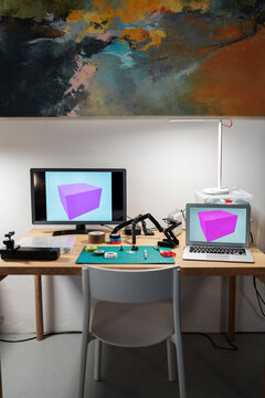Workspace with computer and laptop with 3D illustration