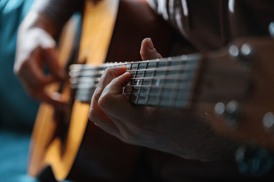 Playing Acoustic Guitar
