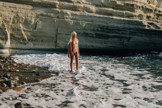 Teen girl on the shore