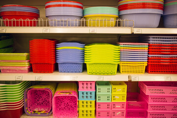 The photo shows a selection of plastic box or basket organizer selling on a department store.