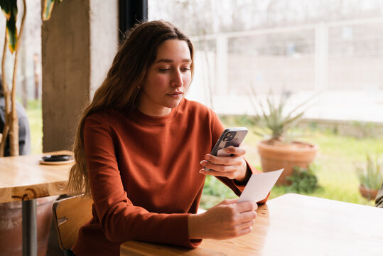 Customers Scanning Menu QR Code On Cell Phone