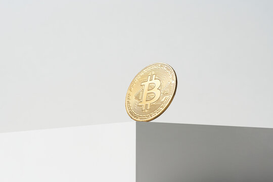 Bitcoin balancing on edge of cube