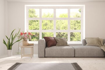 White living room with sofa and summer landscape in window. Scandinavian interior design. 3D illustration