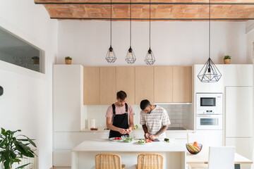 Couple Preparing The Food