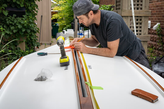 Mahogany Rub Rail Restoration on Hull of Dinghy Sailboat