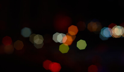 Fototapeta premium Dreamy light spots in the city at night