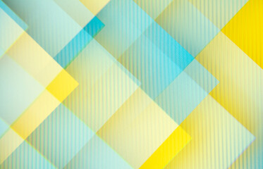 Geometric shapes of yellow and blue paper. Abstract background.