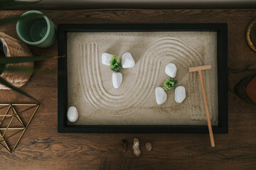 Zen Garden On Brown Wooden Table.