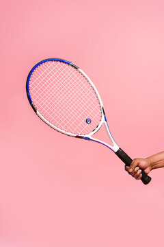 Hand holding Tennis Racket