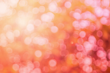 Abstract blurred orange color and peach for background, Blur festival lights outdoor and pink bubble focus design element.