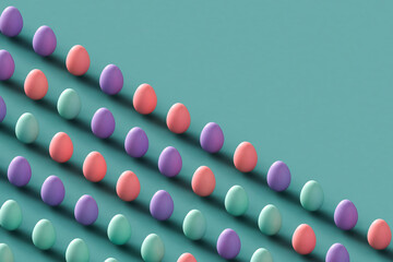 Colorful Easter eggs on a pastel blue background with copy space.