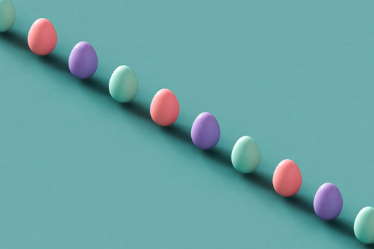 a row of Colorful Easter eggs on a pastel blue background. 3d render