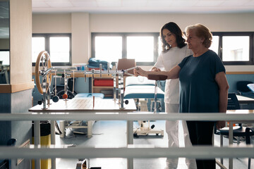 Doctor and patient during physiotherapy session