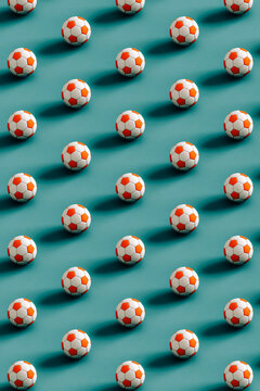 pattern of Soccer balls ona  blue background. 3d render
