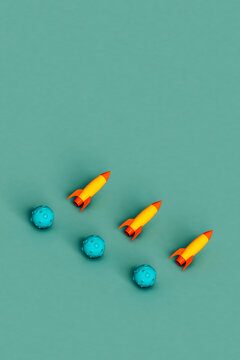 Space shuttles and space rock on green background