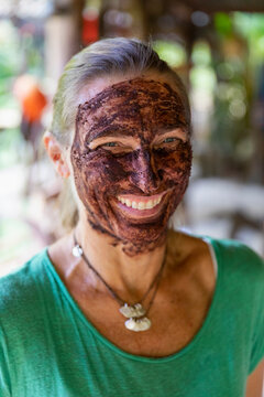 Portrait of Woman with Chocolate paste on her face for healthy skin