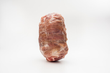 A frozen tantuni roll. Frozen meat.