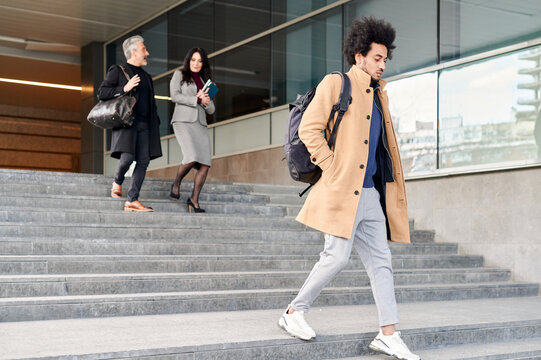Young businessman leaving work for the day
