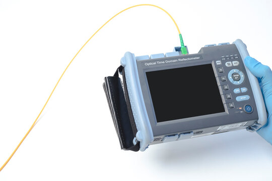 Internet technicians are measuring the light signal using the Optical Time Domain Reflectometer. To measure the termination of light for maintenance of fiber optics