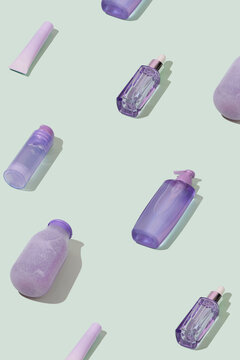 Cosmetic products packaging pattern, angle view, mint green background