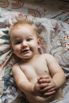 baby laying in bed