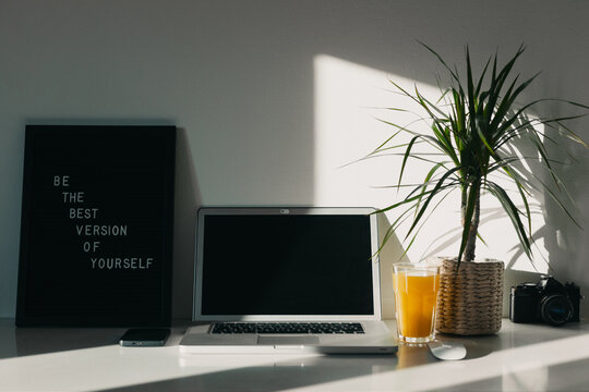 Sunshine On Desk In Room.
