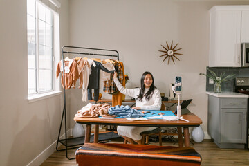 Entrepeneur showing her handmade products online 